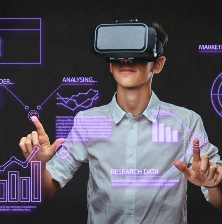 Teenager using virtual reality glasses with graph charts, numbers, lines. Teenager dressed in a white t-shirt using virtual reality glasses with graph charts, numbers, lines. Technology concept.